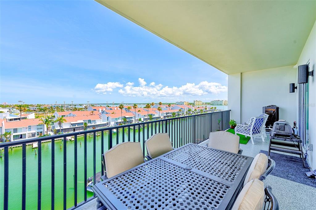 400 150th Avenue, Unit 504 Madeira Beach, FL 33708 - Photo 23 of 60 a view of a balcony with furniture