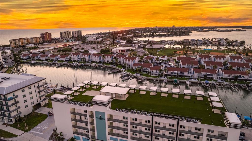400 150th Avenue, Unit 504 Madeira Beach, FL 33708 - Photo 34 of 60 a view of a city and lake