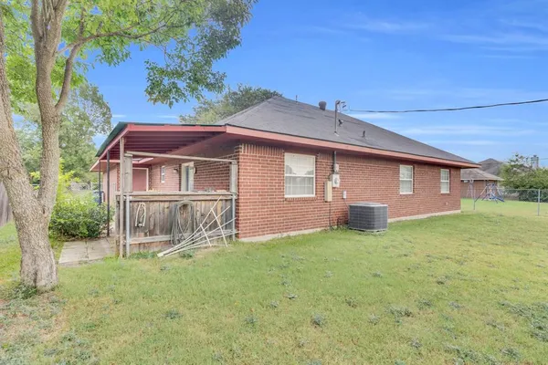a house view with a garden space