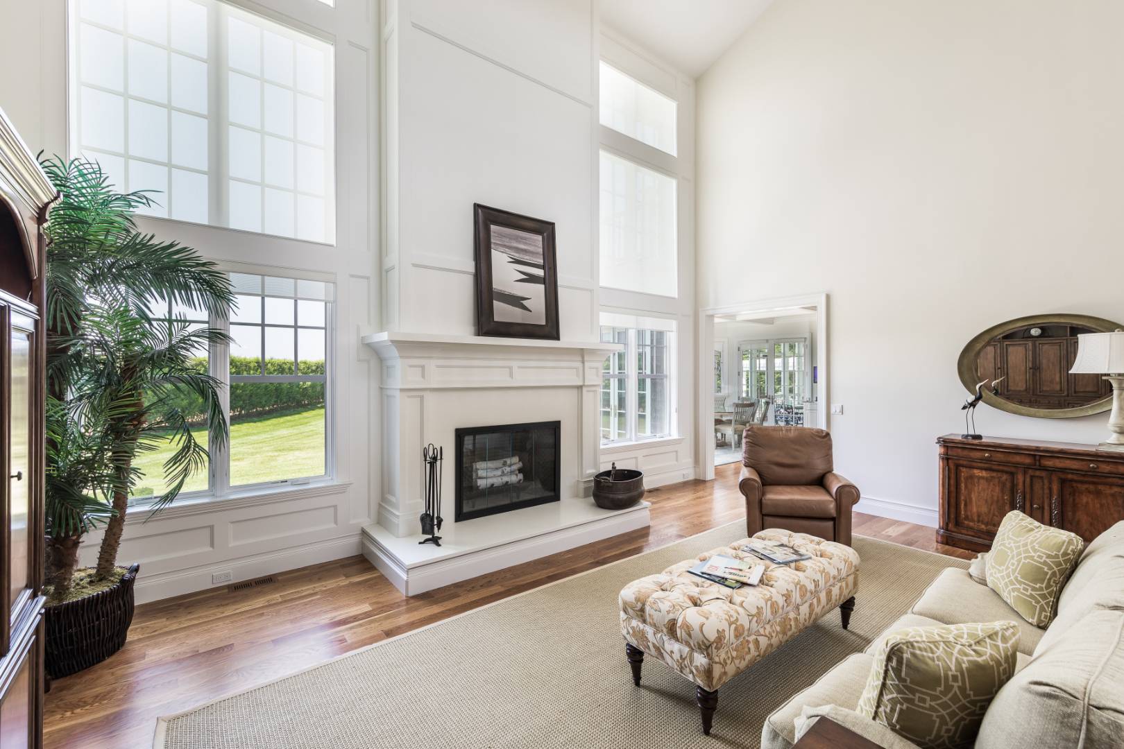 170 Scuttle Hole Road Water Mill, NY 11976 - Photo 6 of 33 a living room with furniture and a fireplace