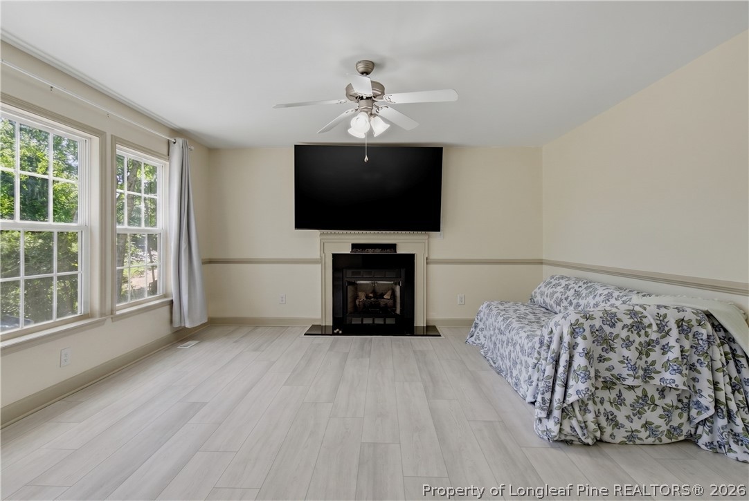 1075 Buffalo Lake Road Sanford, NC 27332 - Photo 14 of 49 a living room with furniture and a flat screen tv