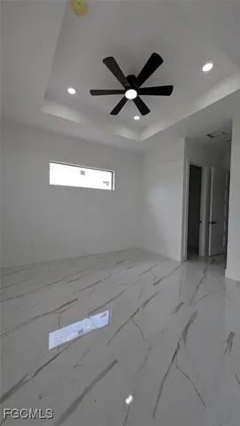 a bathroom with a sink vanity and mirror