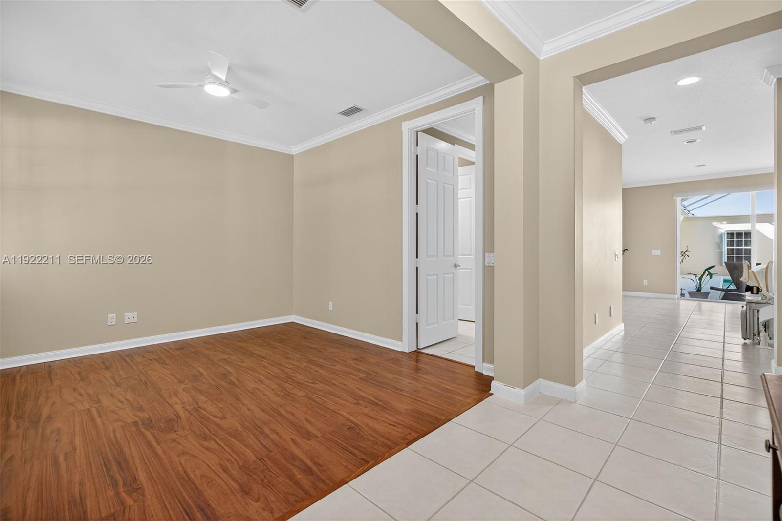 3518 Community Drive Jupiter, FL 33458 - Photo 6 of 38 a view of a room with wooden floor