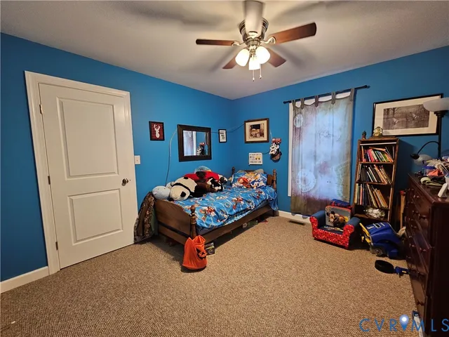 a bedroom with furniture and a bed