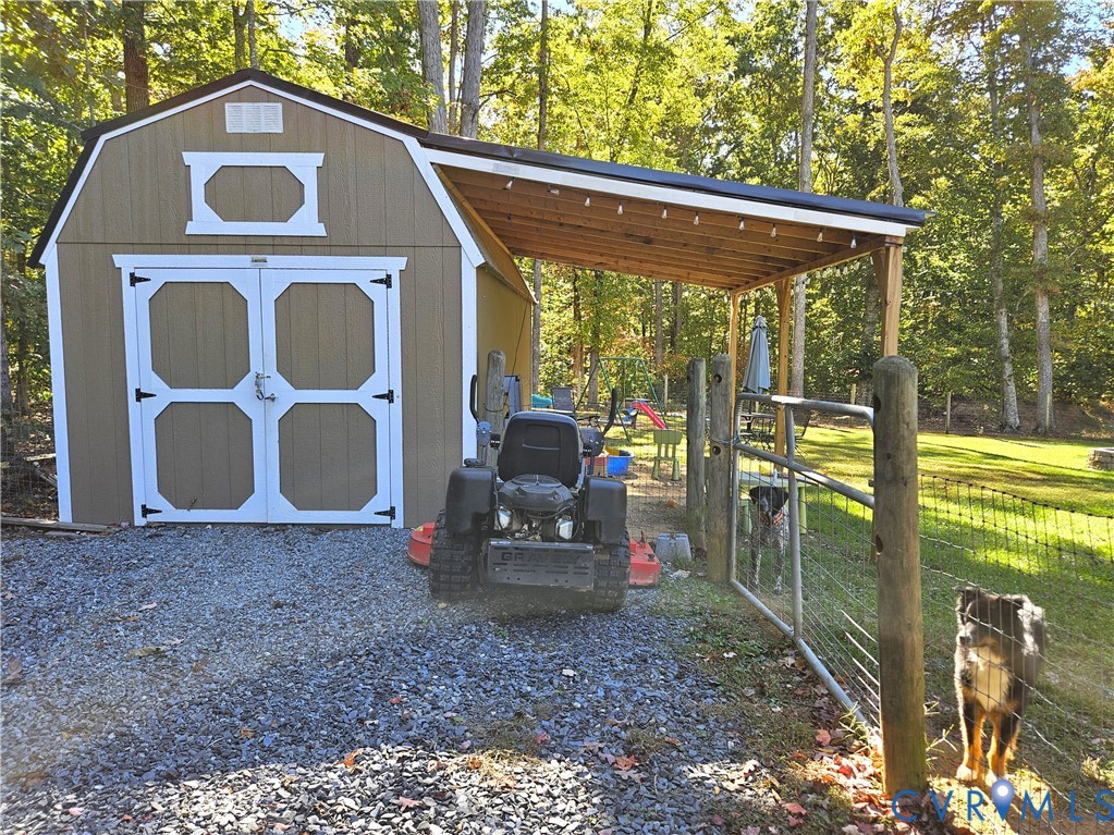 3286 Ranson Road Dillwyn, VA 23936 - Photo 20 of 25 a view of a outdoor space with a porch