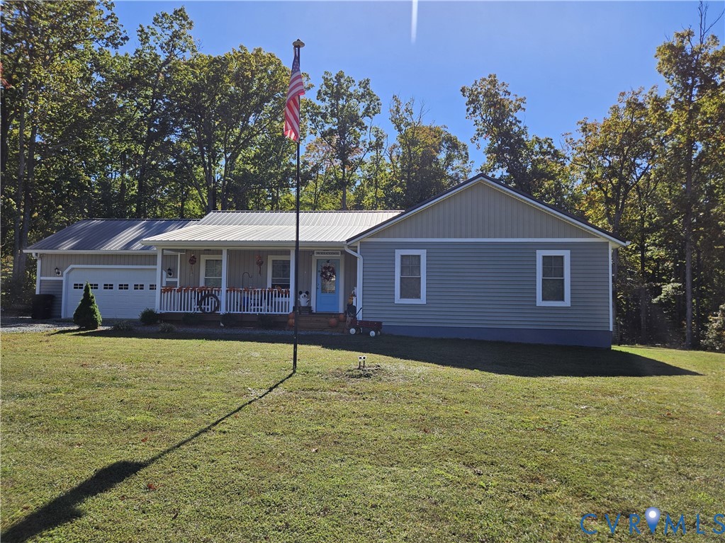 3286 Ranson Road Dillwyn, VA 23936 - Photo 2 of 25 a front view of a house with garden