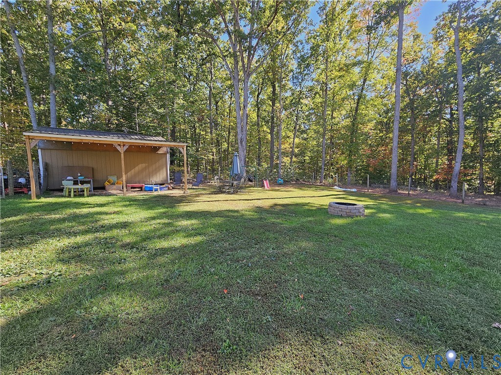 3286 Ranson Road Dillwyn, VA 23936 - Photo 21 of 25 a backyard with large trees