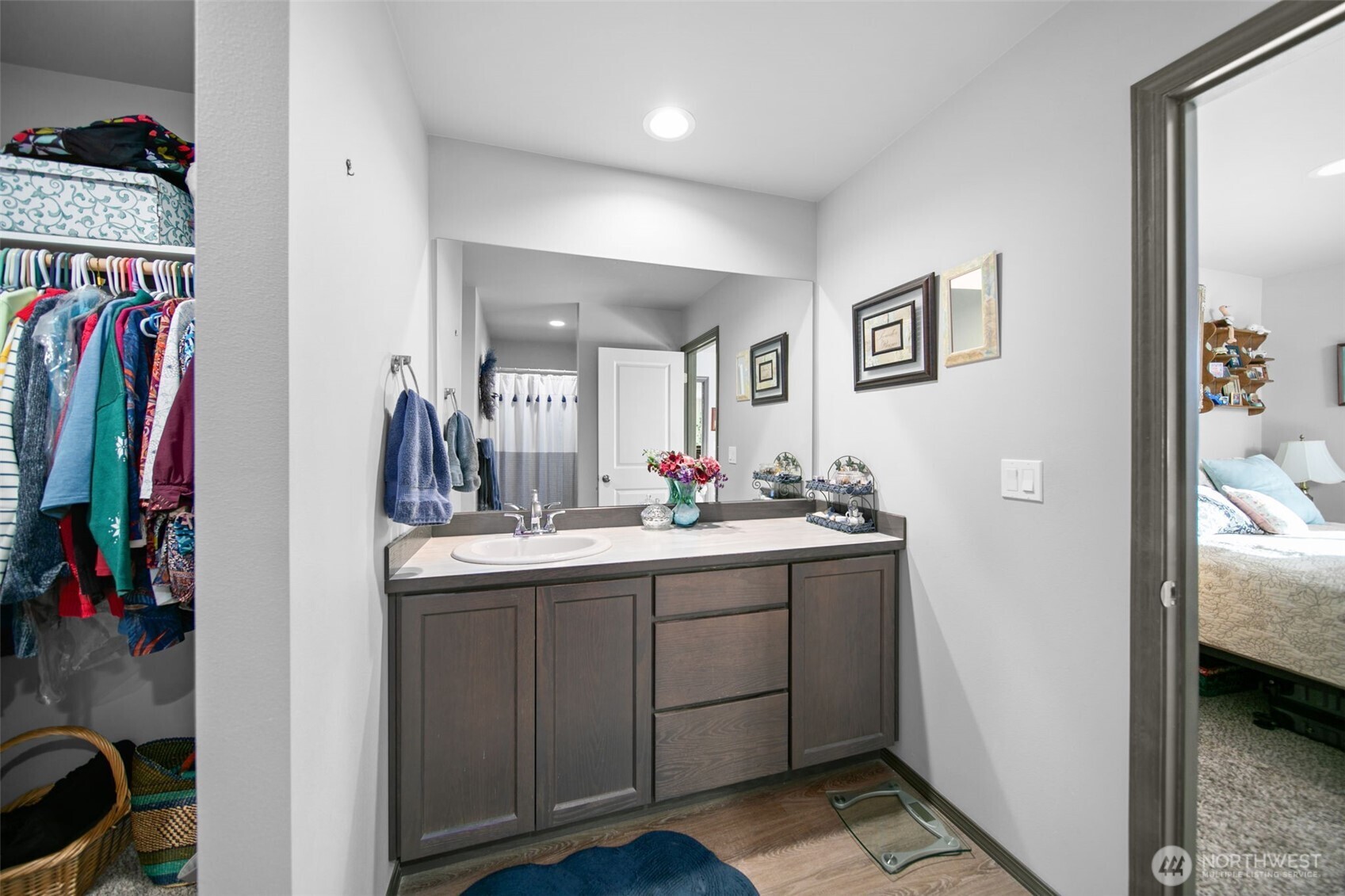 2314 Southeast Marlette Road East Wenatchee, WA 98802 - Photo 18 of 29 a bathroom with a sink a mirror and a shower