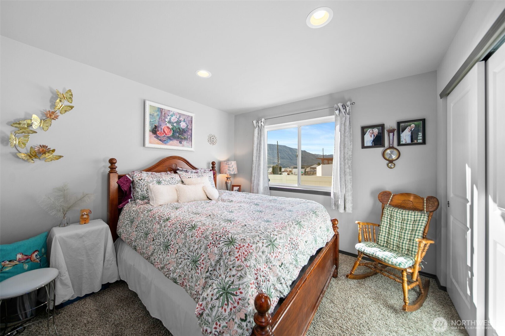 2314 Southeast Marlette Road East Wenatchee, WA 98802 - Photo 18 of 27 a bedroom with a bed and wooden floor