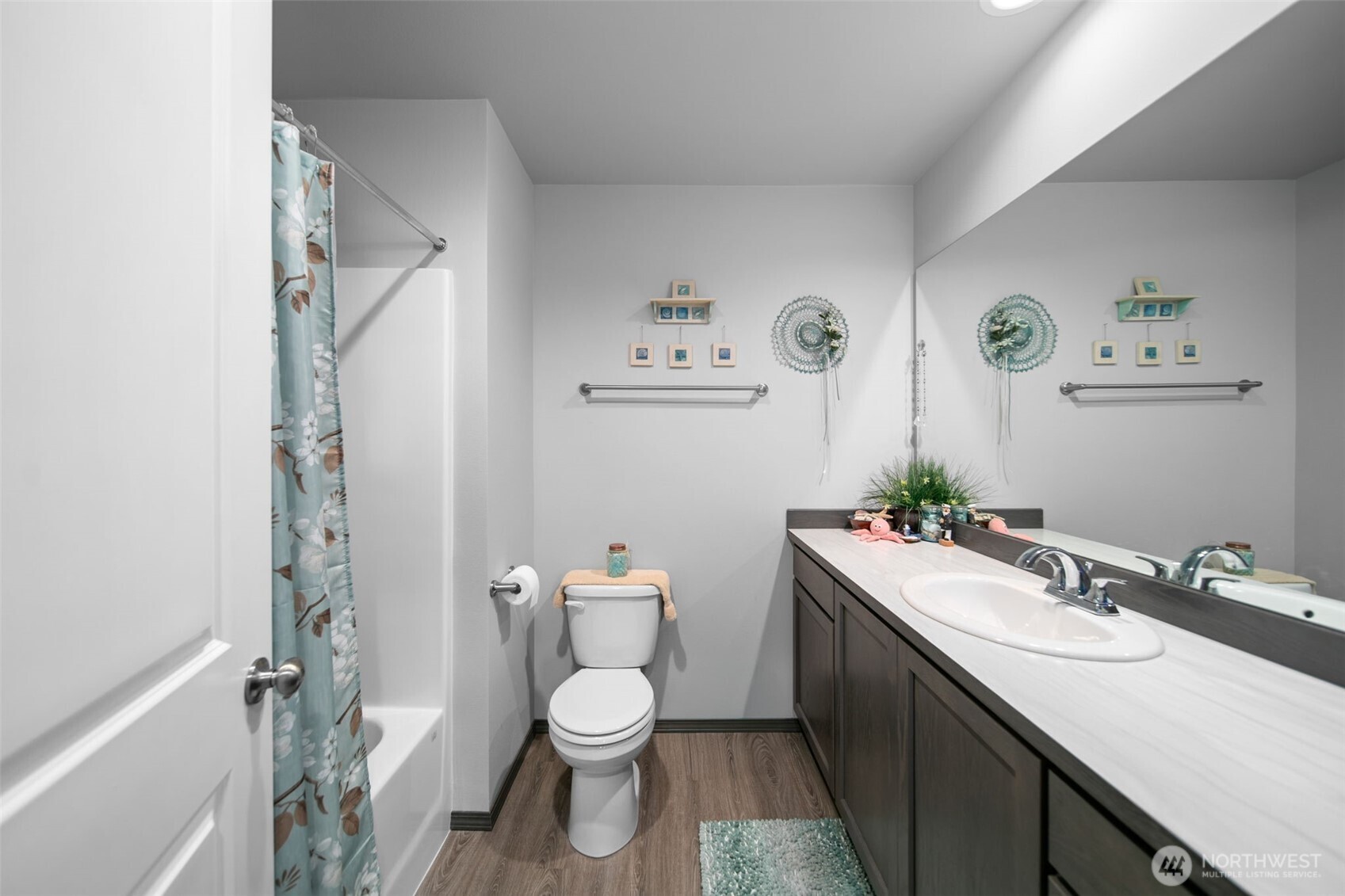 2314 Southeast Marlette Road East Wenatchee, WA 98802 - Photo 19 of 27 a bathroom with a sink a toilet and a mirror
