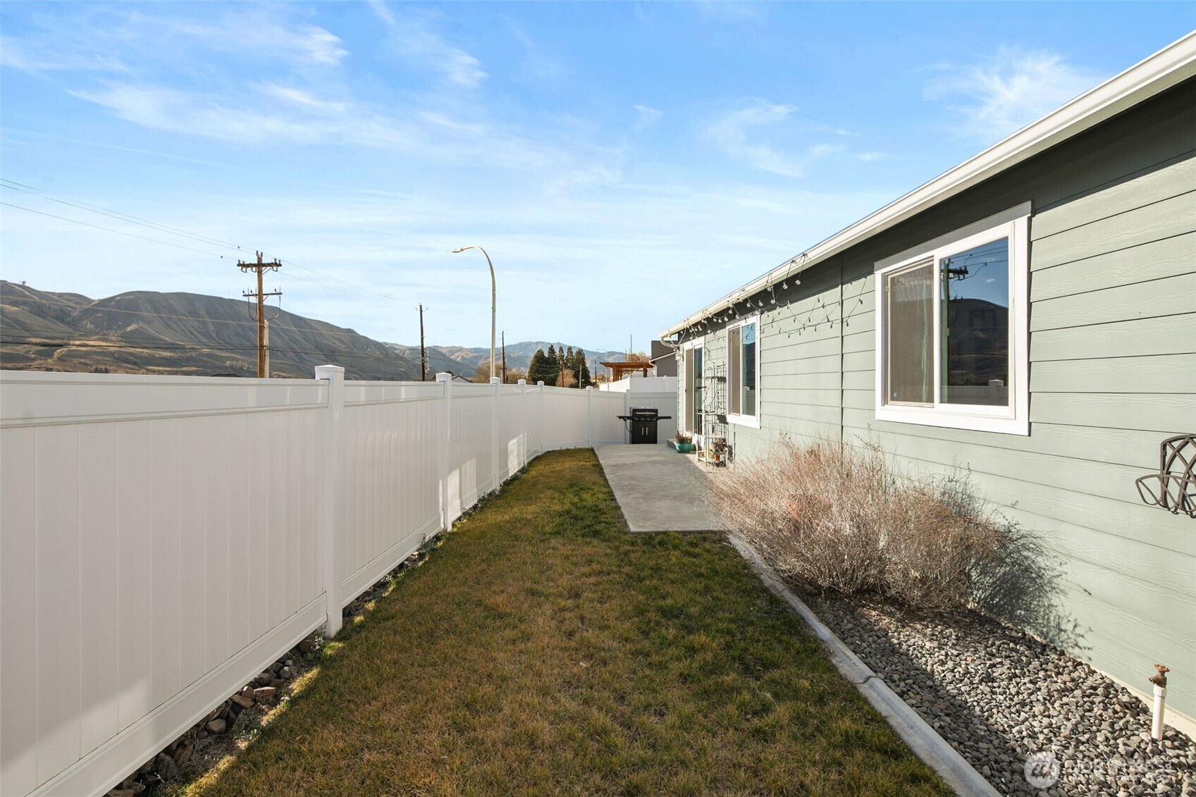 2314 Southeast Marlette Road East Wenatchee, WA 98802 - Photo 24 of 27 a view of a house with a backyard