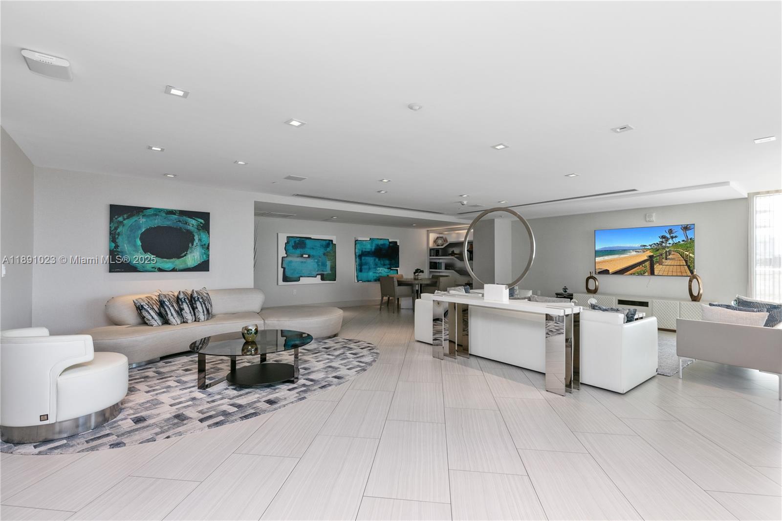 300 Sunny Isles Boulevard, Unit 41607 Sunny Isles Beach, FL 33160 - Photo 37 of 73 a living room with furniture a rug and white walls