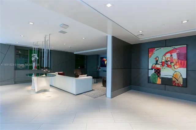 a swimming pool with outdoor seating and yard