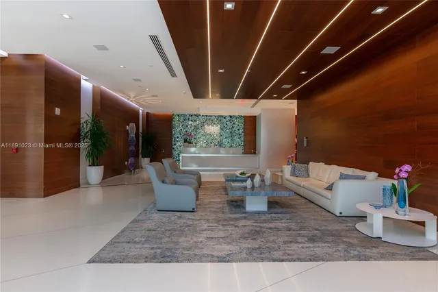 a view of a lake with tall buildings