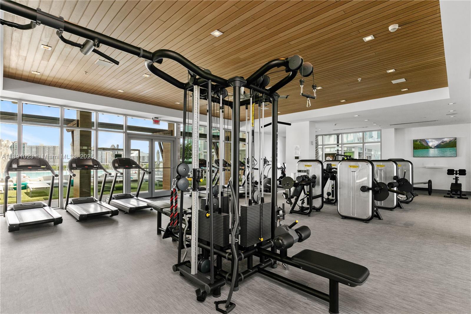 300 Sunny Isles Boulevard, Unit 41607 Sunny Isles Beach, FL 33160 - Photo 48 of 73 a view of a room with gym equipment