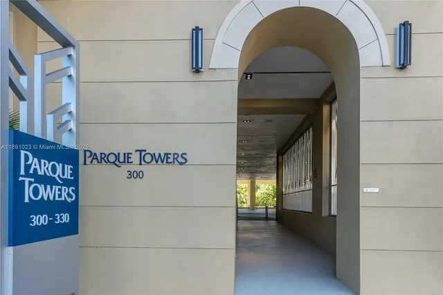 a view of a lake with boats and trees
