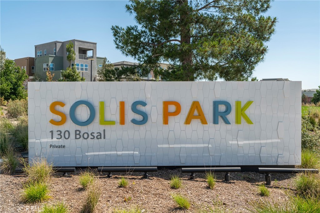 121 Baluster Irvine, CA 92618 - Photo 2 of 80 a sign that is on the wall of a building