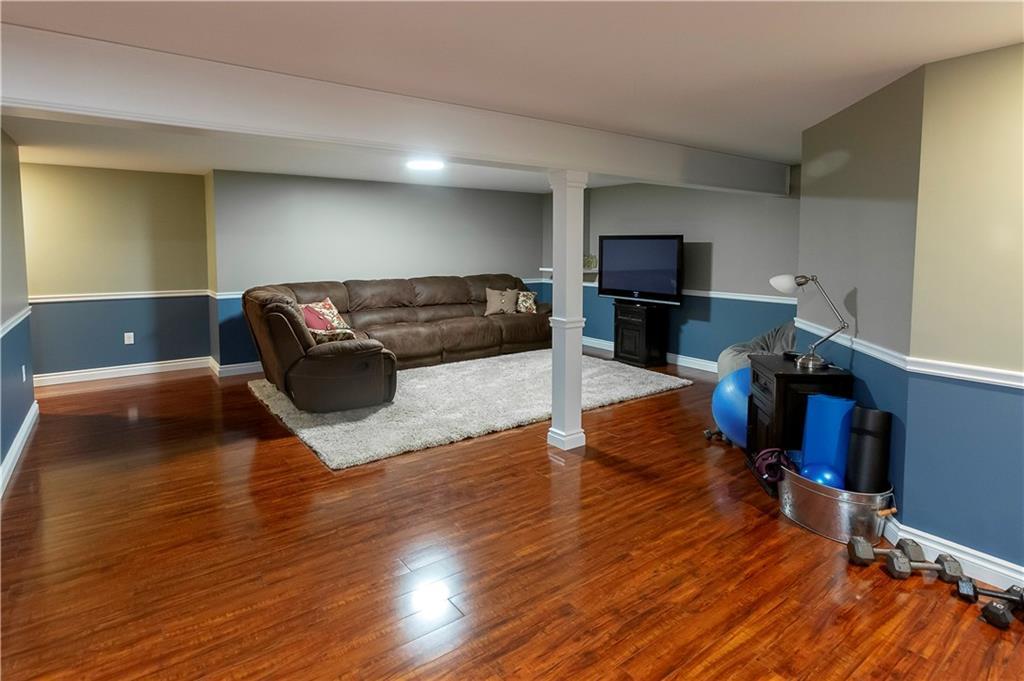 15 Oak Ridge Drive Hermon, ME 04401 - Photo 26 of 35 Finished basement with access to garage.