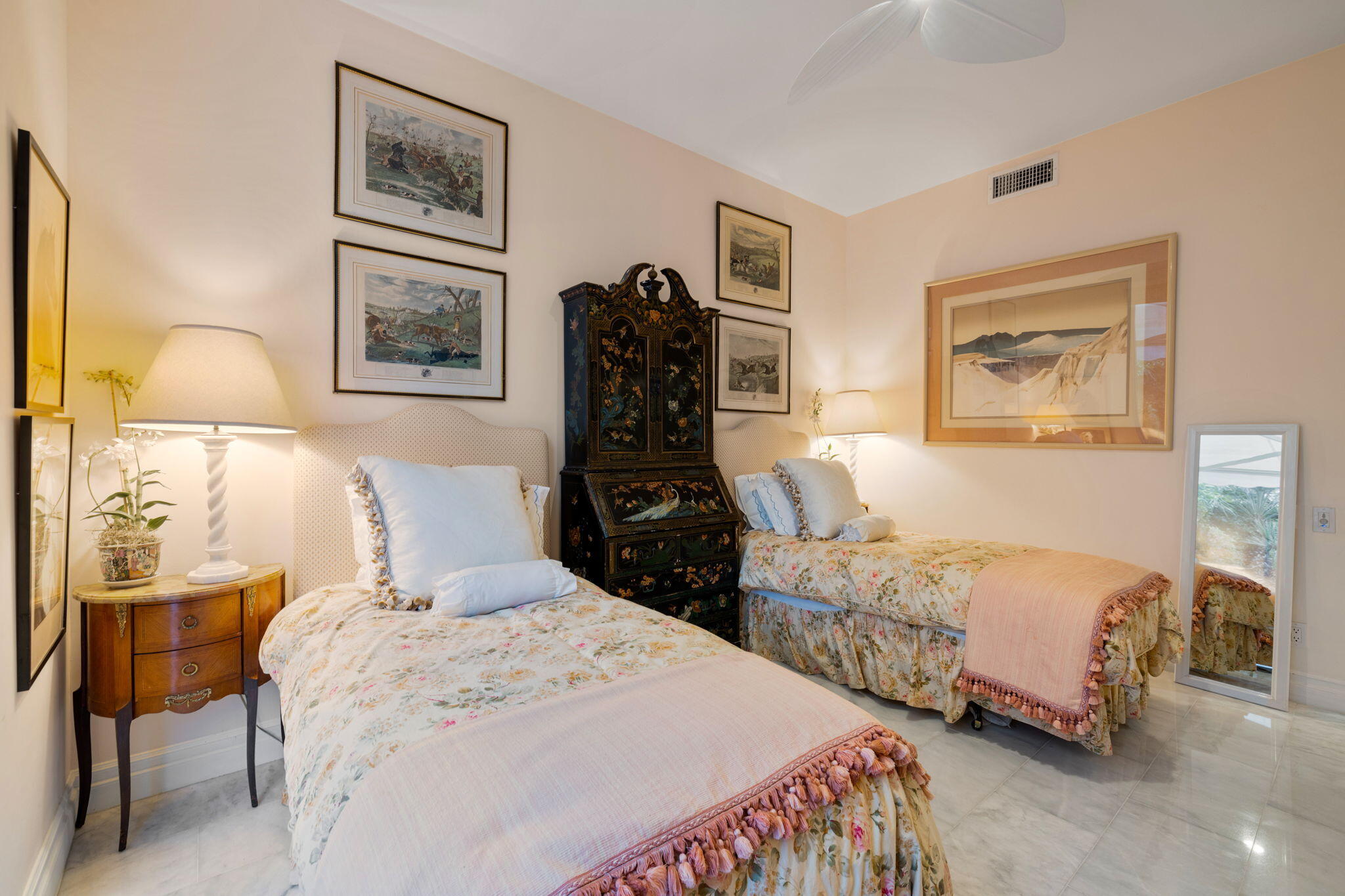 47432 Rabat Drive Palm Desert, CA 92260 - Photo 43 of 46 a bedroom with two beds and a painting on the wall