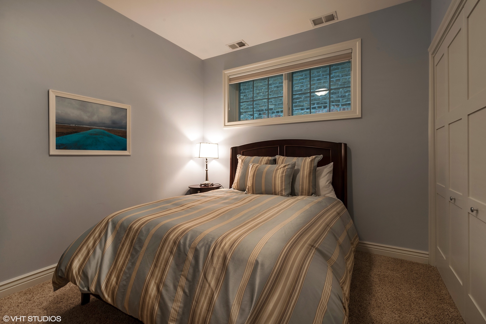 1834 West School Street Chicago, IL 60657 - Photo 17 of 21 a bedroom with a bed and a window