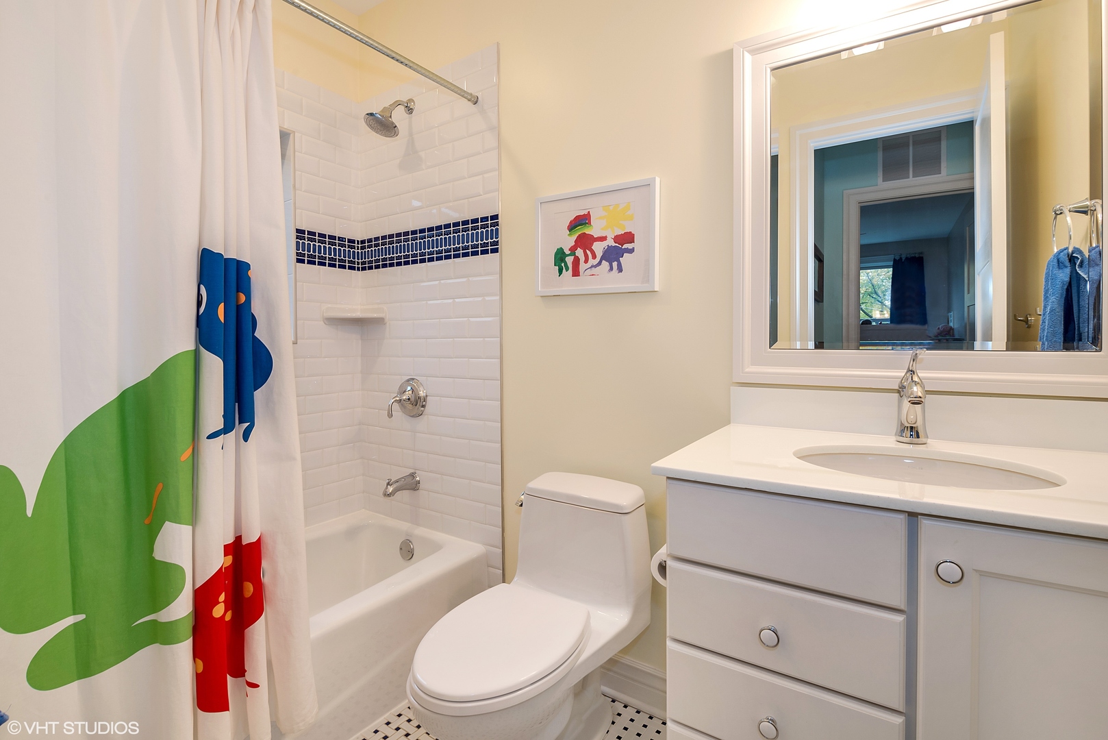 1834 West School Street Chicago, IL 60657 - Photo 19 of 21 a bathroom with a toilet sink vanity tub and shower