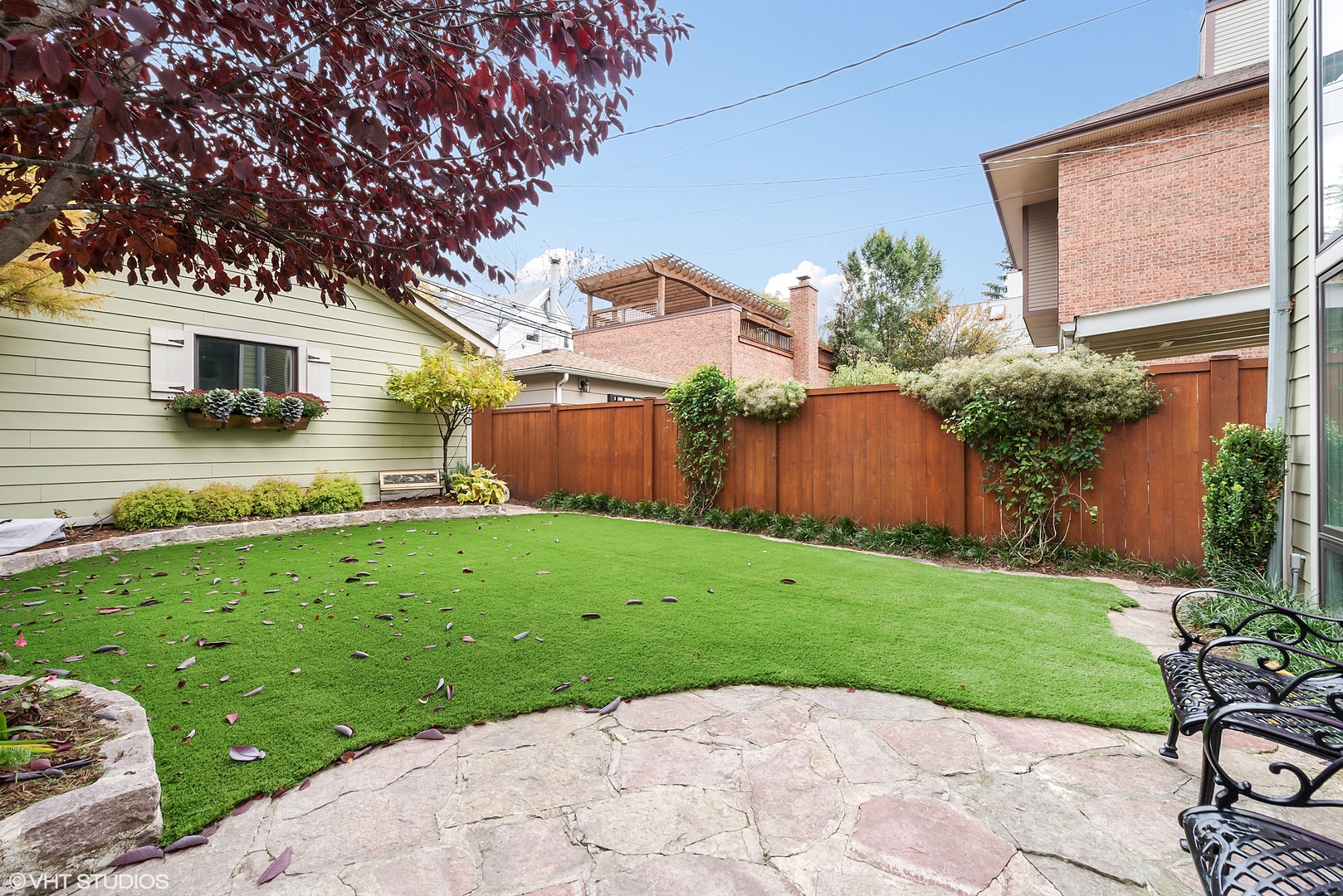 1834 West School Street Chicago, IL 60657 - Photo 20 of 21 a front view of a house with garden