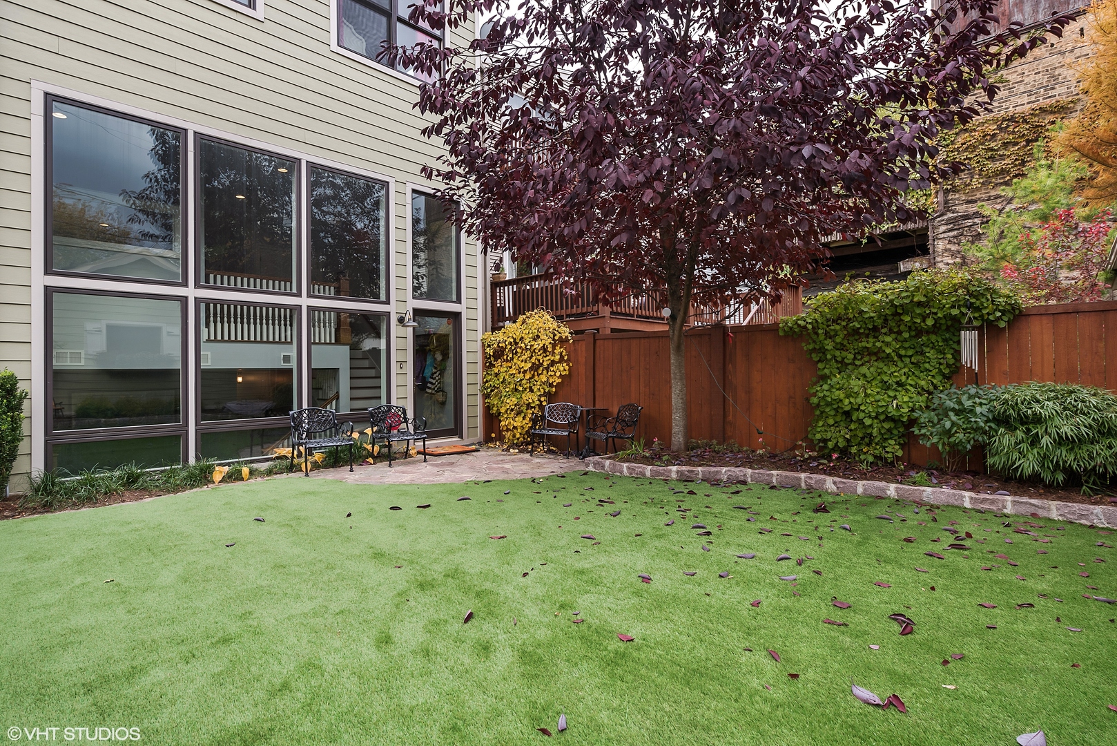 1834 West School Street Chicago, IL 60657 - Photo 21 of 21 a view of an house with backyard space and garden