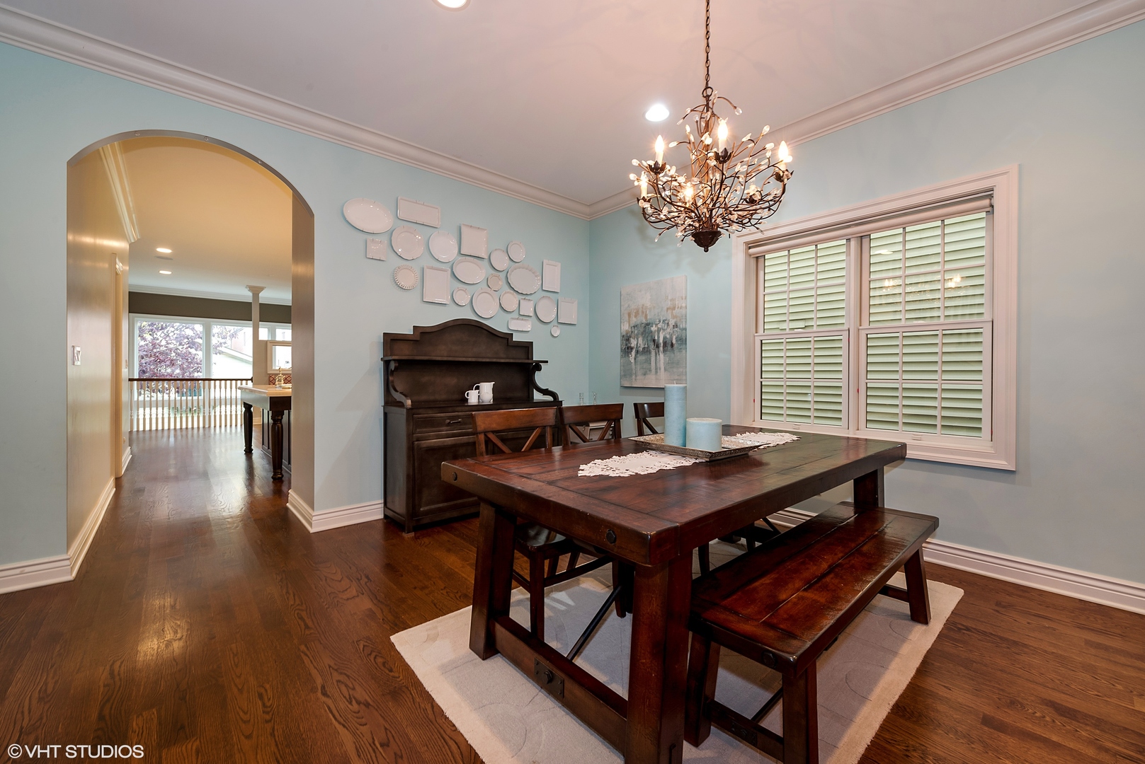 1834 West School Street Chicago, IL 60657 - Photo 7 of 21 a view of a dining room with furniture and wooden floor