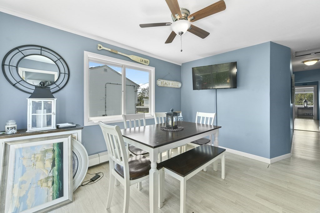 19 Loring Road Revere, MA 02151 - Photo 11 of 17 a room with furniture and a mirror