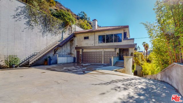 a view of a house with a patio