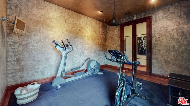 a view of a chairs and table in the patio