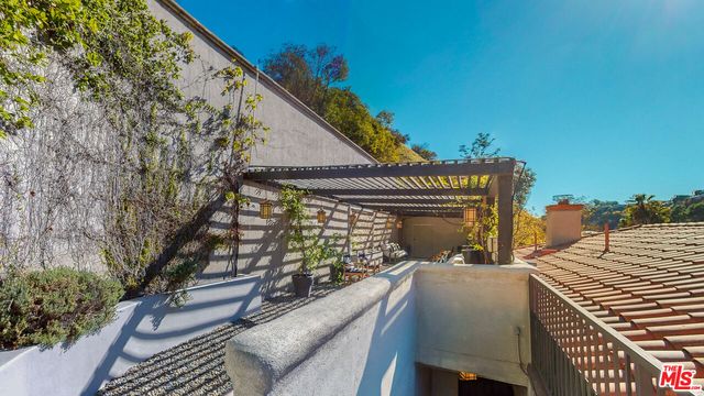 a balcony with furniture
