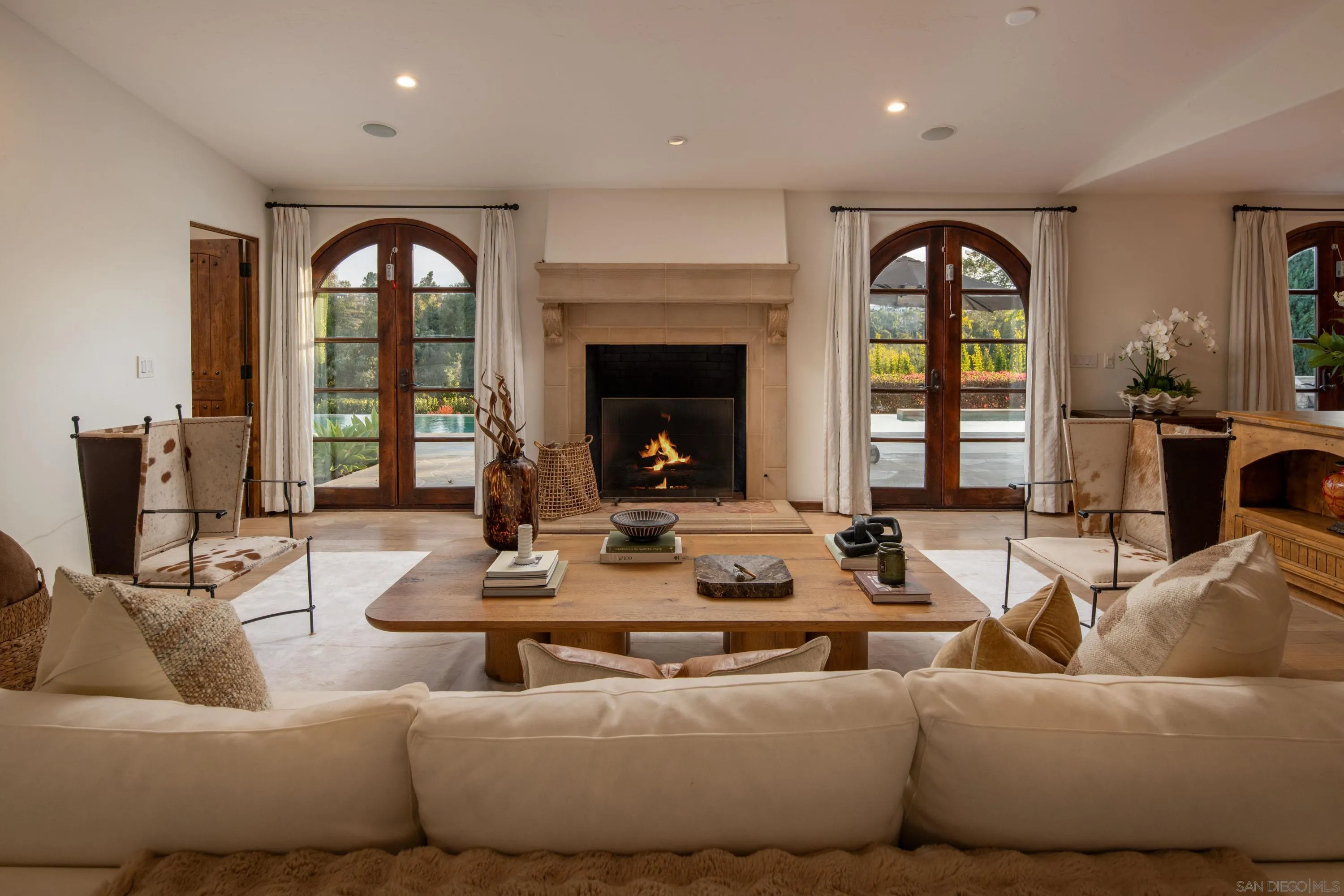 6511 Poco Lago Rancho Santa Fe, CA 92067 - Photo 2 of 24 a living room with furniture and a large window