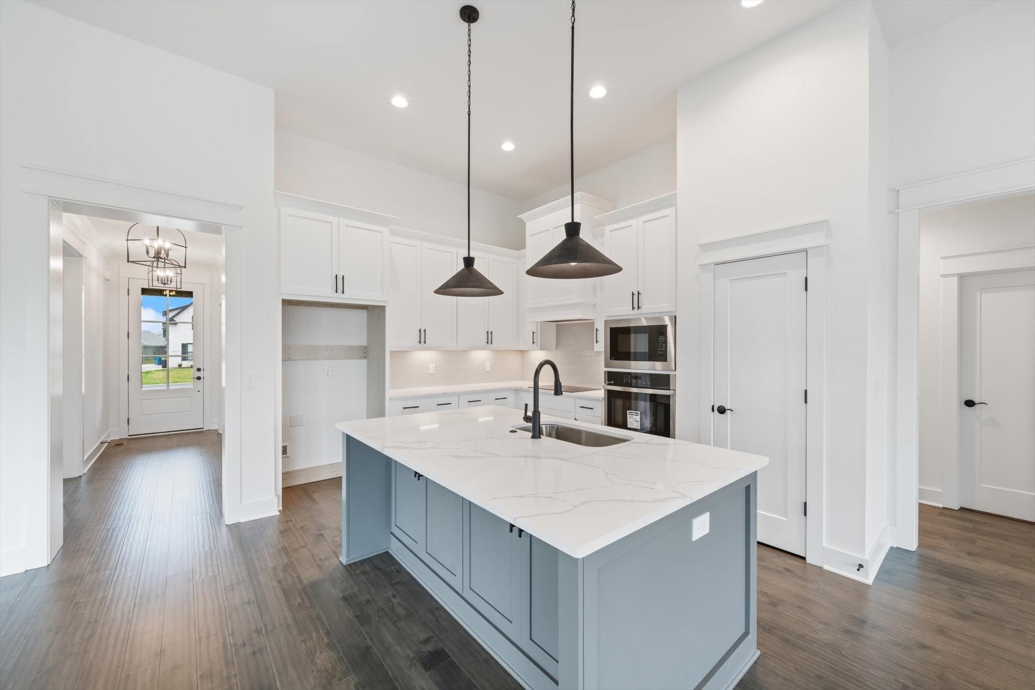 2631 Holly Spring Drive Murfreesboro, TN 37128 - Photo 13 of 33 a kitchen with a refrigerator a sink and wooden floor