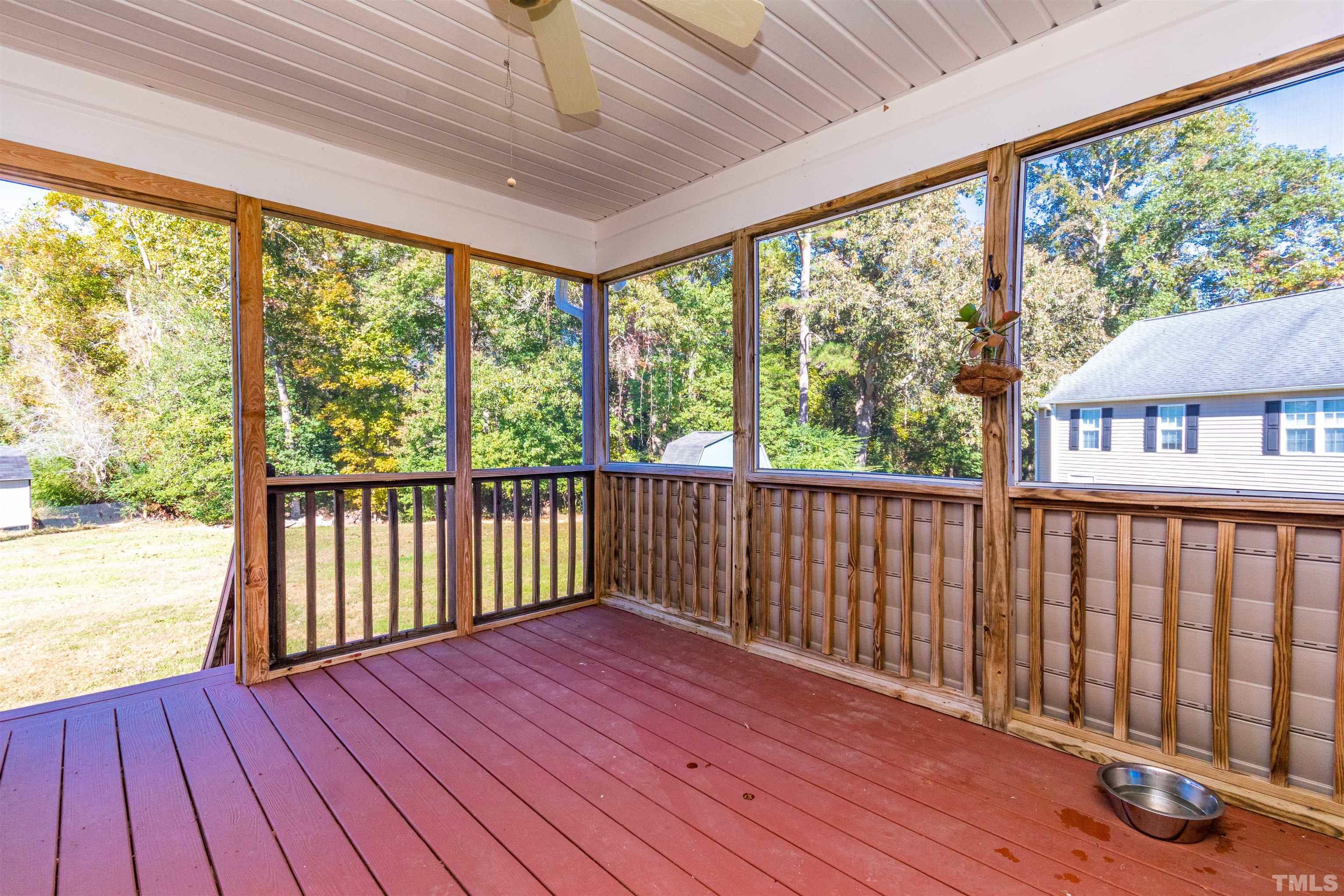519 Axum Road Willow Spring, NC 27592 - Photo 27 of 30 a view of a balcony with wooden floor