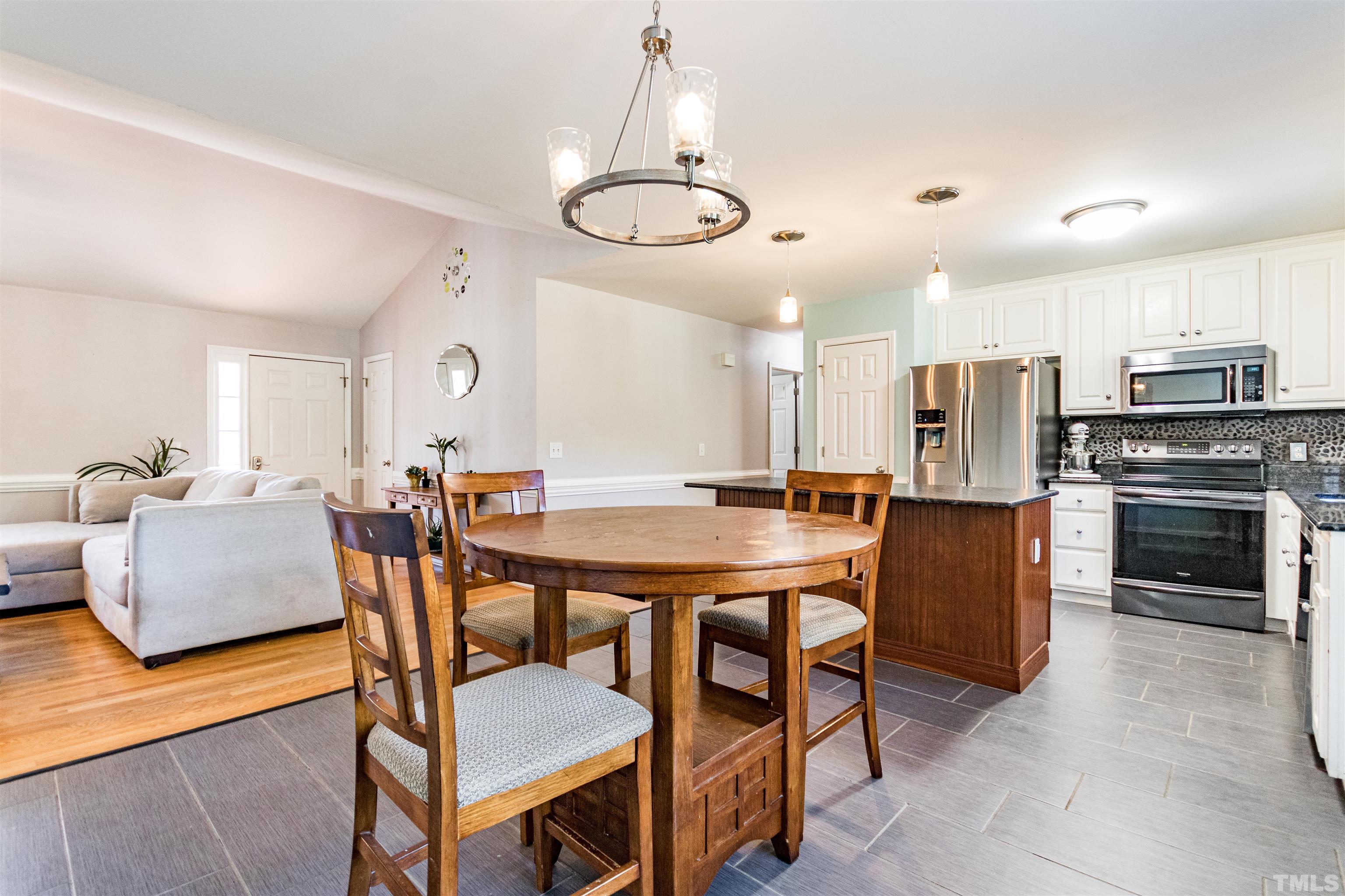 519 Axum Road Willow Spring, NC 27592 - Photo 9 of 30 a view of kitchen with sink and microwave