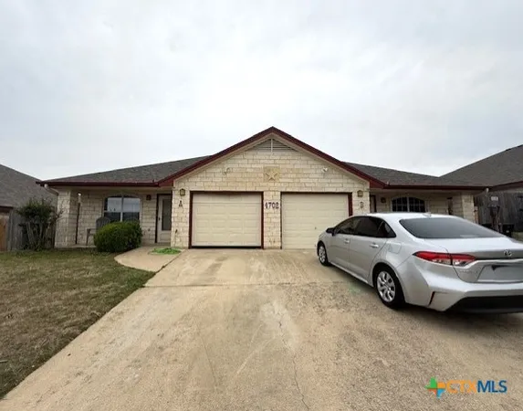 a car parked in front of house