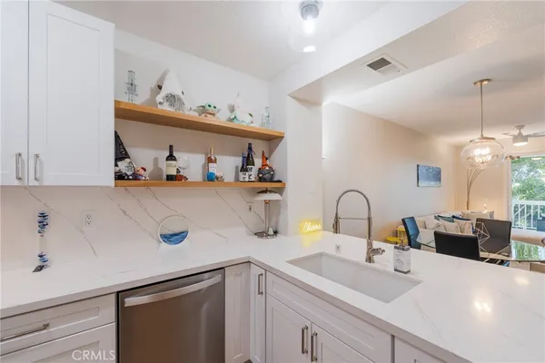 $669,000 | 20371 Bluffside Circle, Unit 212, Huntington Beach, CA 92646