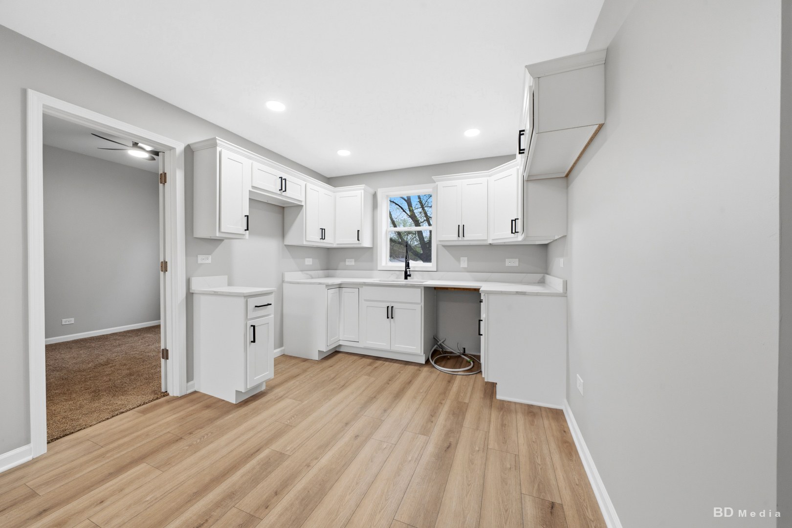 3300 Butler Avenue Steger, IL 60475 - Photo 11 of 16 a kitchen with stainless steel appliances a sink cabinets and wooden floor