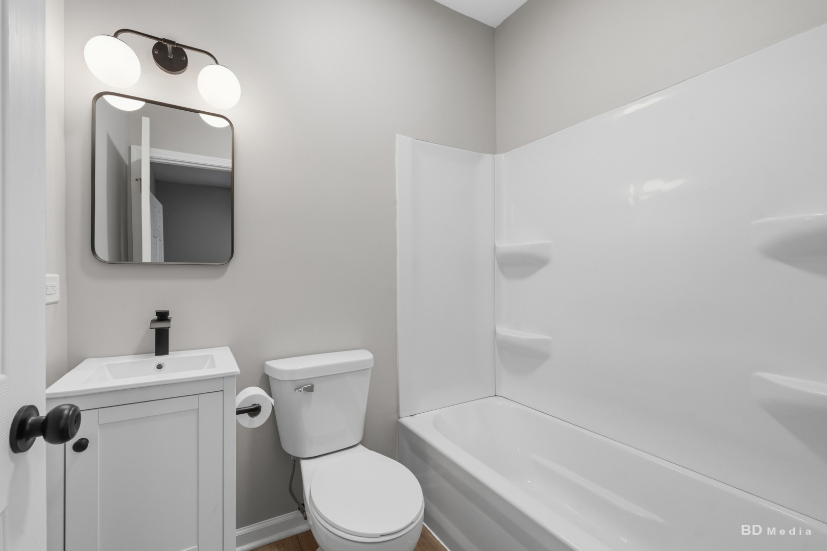 3300 Butler Avenue Steger, IL 60475 - Photo 16 of 16 a bathroom with a toilet sink and bathtub