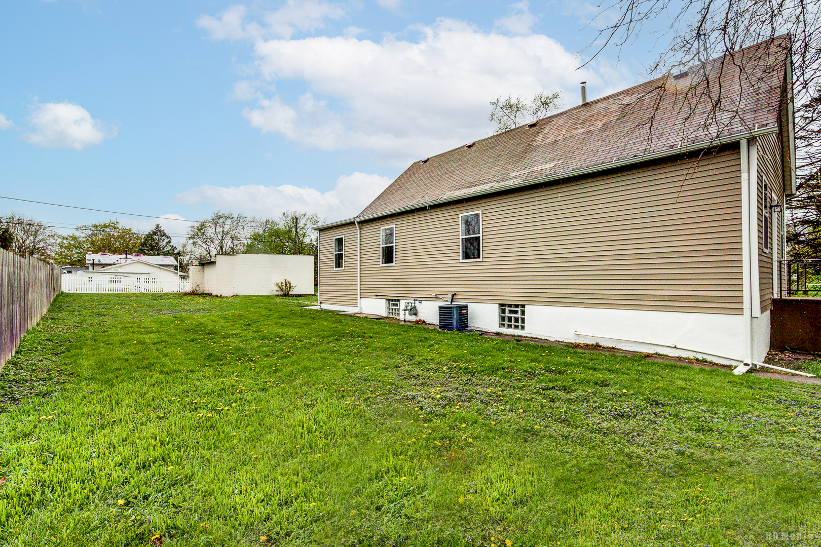 3300 Butler Avenue Steger, IL 60475 - Photo 3 of 16 a view of a backyard with plants and a garden