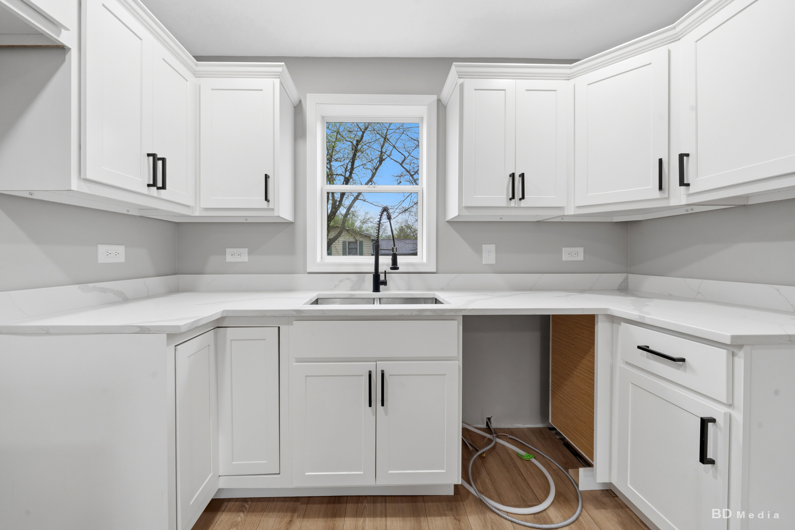 3300 Butler Avenue Steger, IL 60475 - Photo 9 of 16 a kitchen with white cabinets and a sink