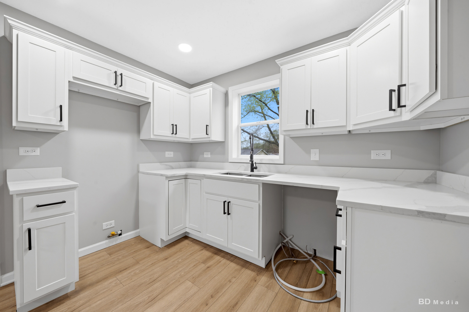 3300 Butler Avenue Steger, IL 60475 - Photo 10 of 16 a kitchen with a sink cabinets and appliances