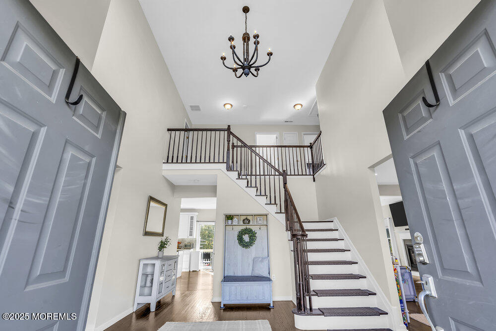 11 Cutter Court Cream Ridge, NJ 08514 - Photo 12 of 87 a view of entryway and hall with wooden floor