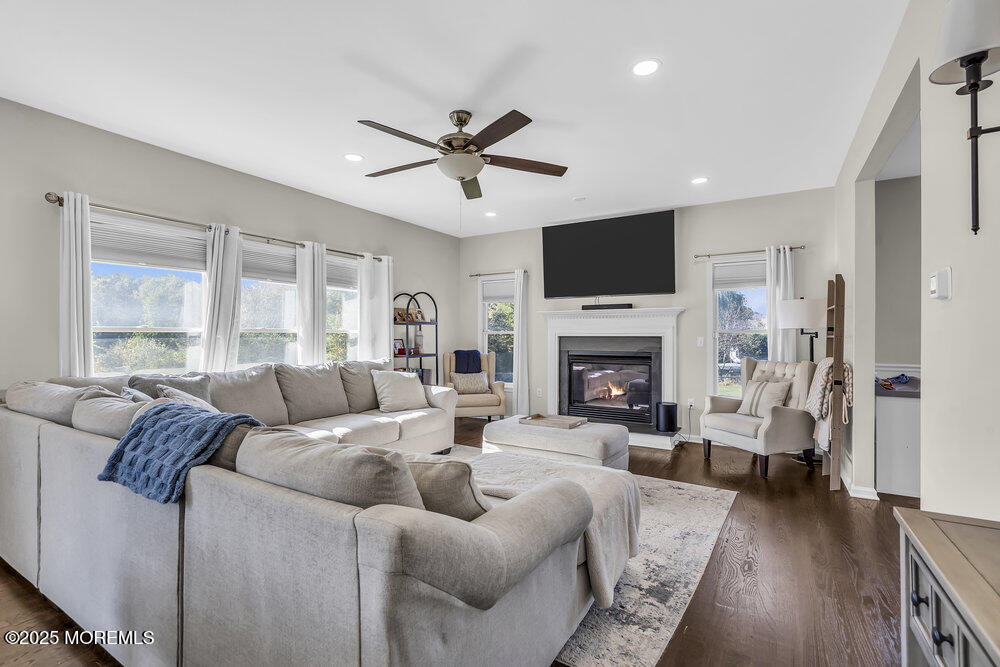 11 Cutter Court Cream Ridge, NJ 08514 - Photo 24 of 87 a living room with furniture fireplace and a flat screen tv