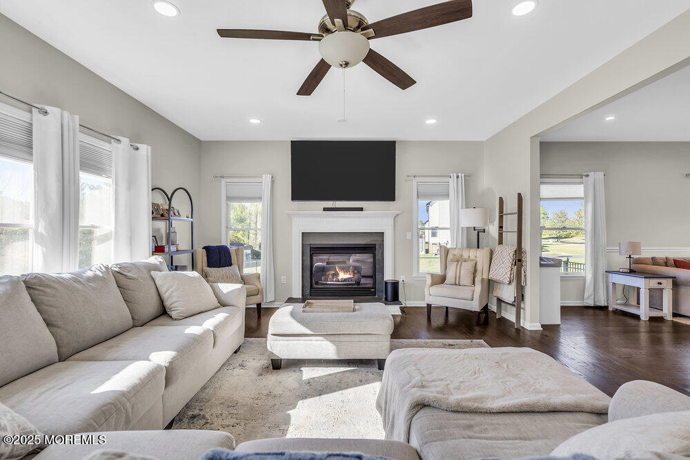11 Cutter Court Cream Ridge, NJ 08514 - Photo 25 of 87 a living room with furniture fireplace and a flat screen tv