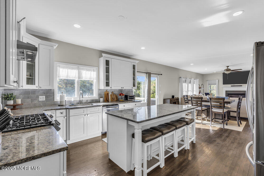 11 Cutter Court Cream Ridge, NJ 08514 - Photo 41 of 87 a kitchen with stainless steel appliances granite countertop a stove and a sink