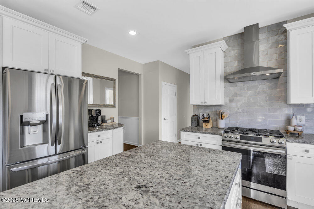 11 Cutter Court Cream Ridge, NJ 08514 - Photo 43 of 87 a kitchen with stainless steel appliances a refrigerator stove and sink