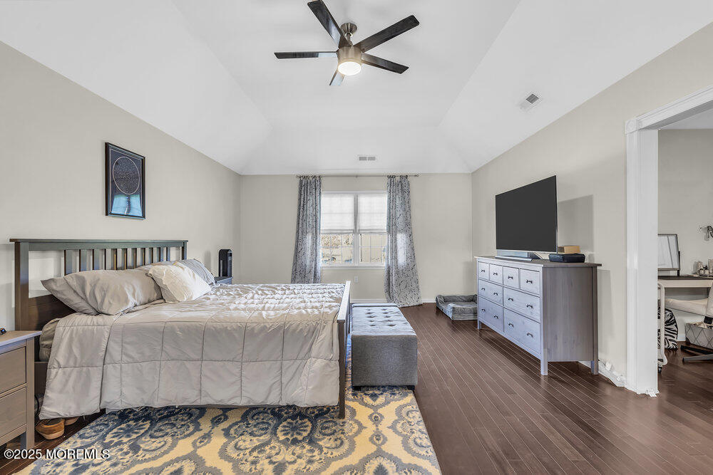 11 Cutter Court Cream Ridge, NJ 08514 - Photo 53 of 87 a living room with furniture and a flat screen tv