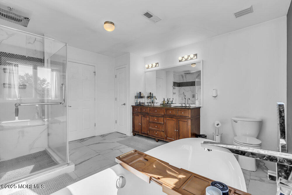 11 Cutter Court Cream Ridge, NJ 08514 - Photo 60 of 87 a room with a wooden floor and white doors